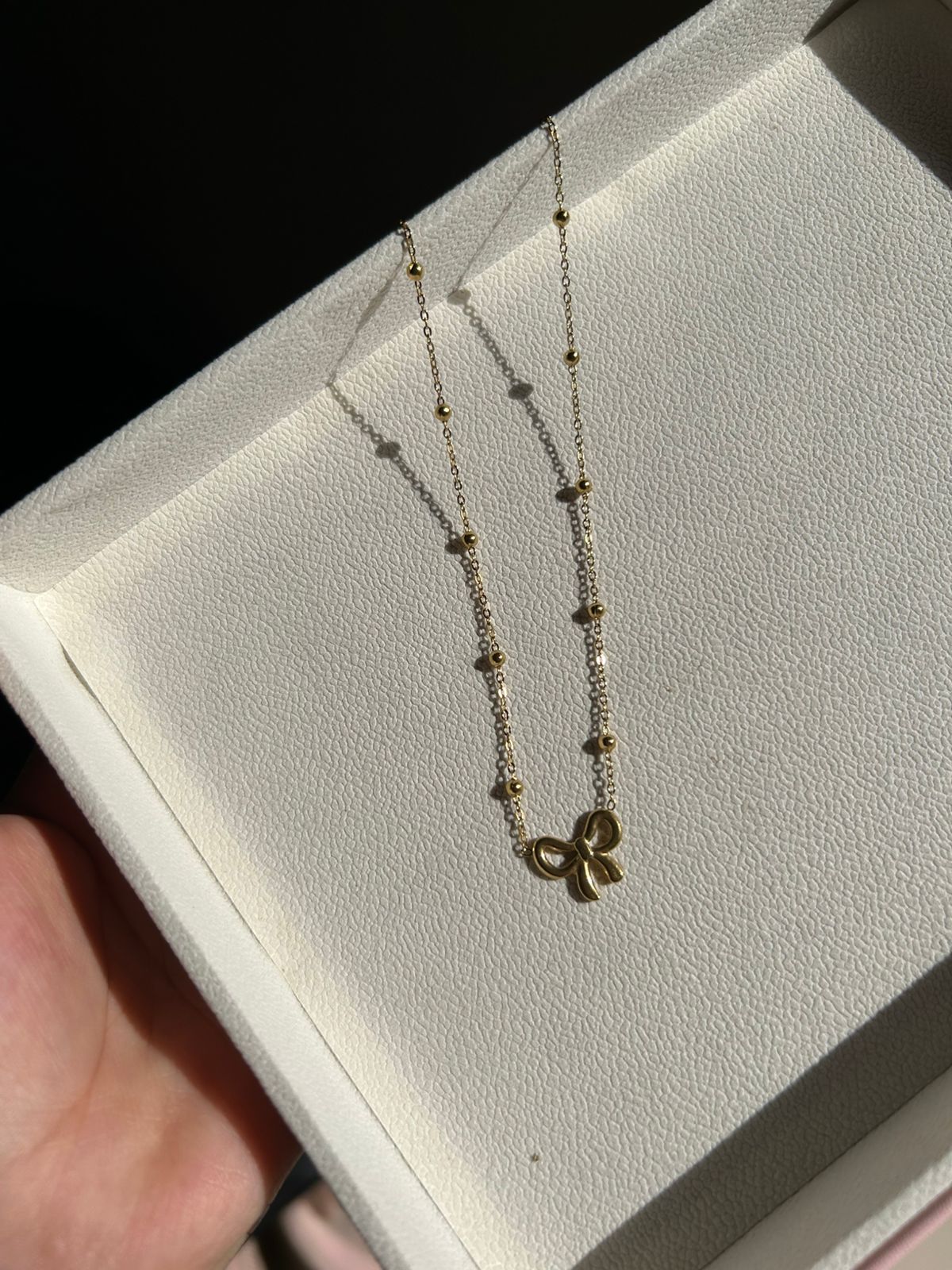 Bow pendant
