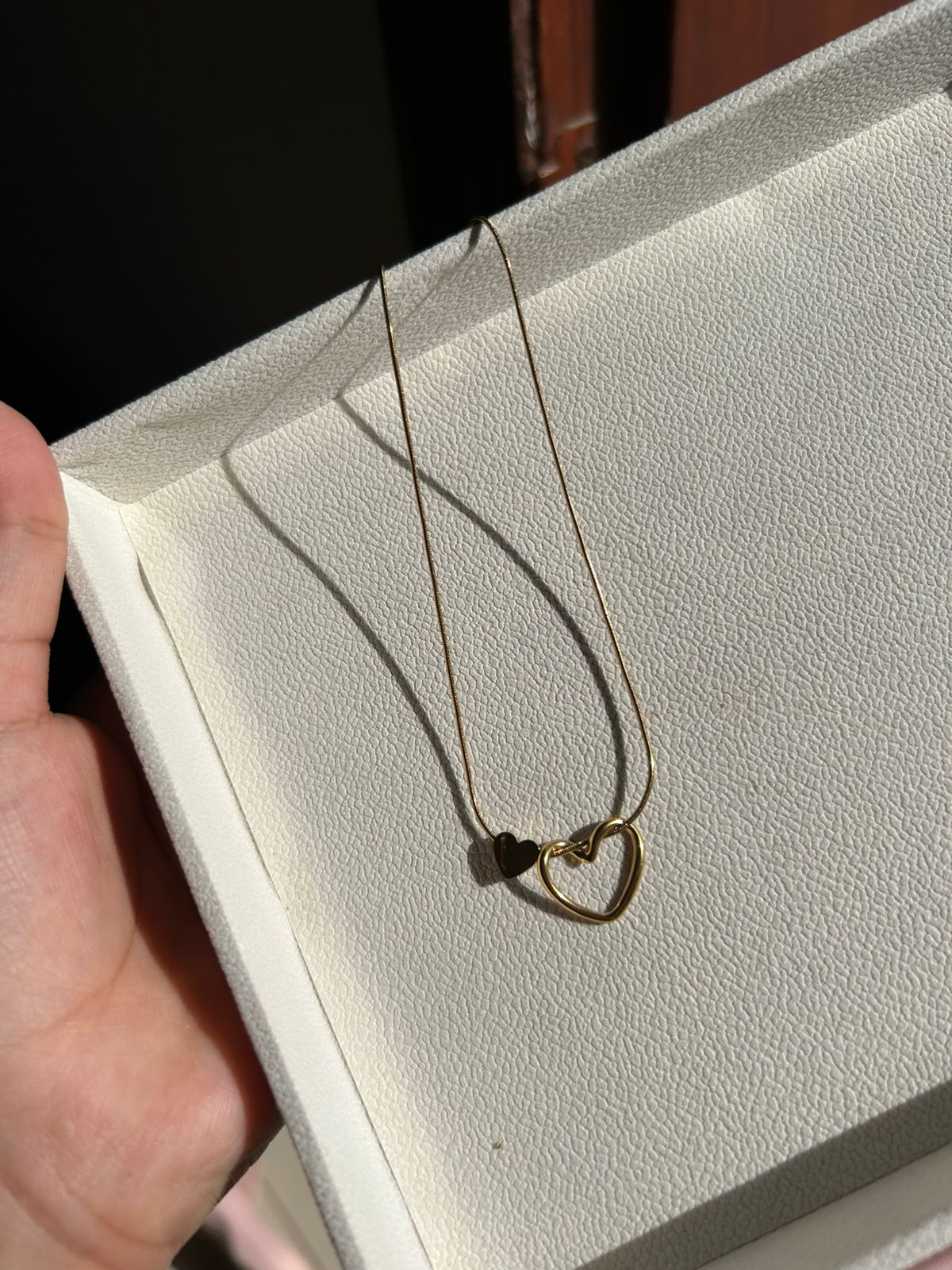 Double heart pendant